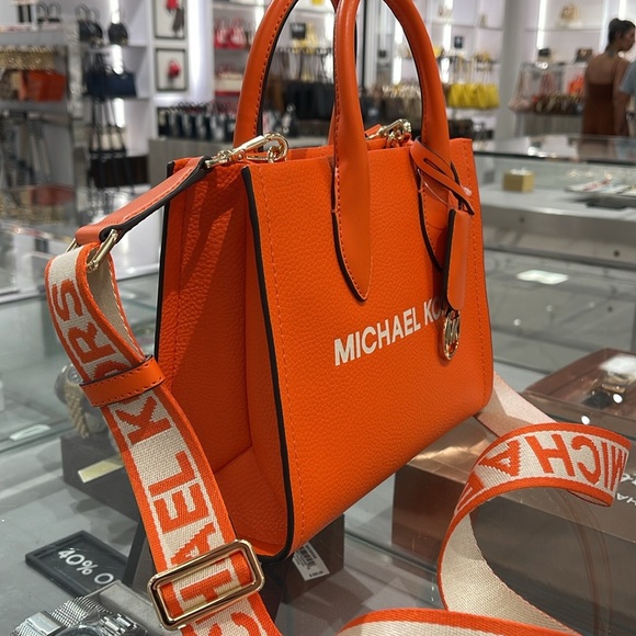 Michael Kors Mirella Small Pebbled Leather Shopper Top Zip Crossbody XBODY
Poppy - Picture 3 of 16